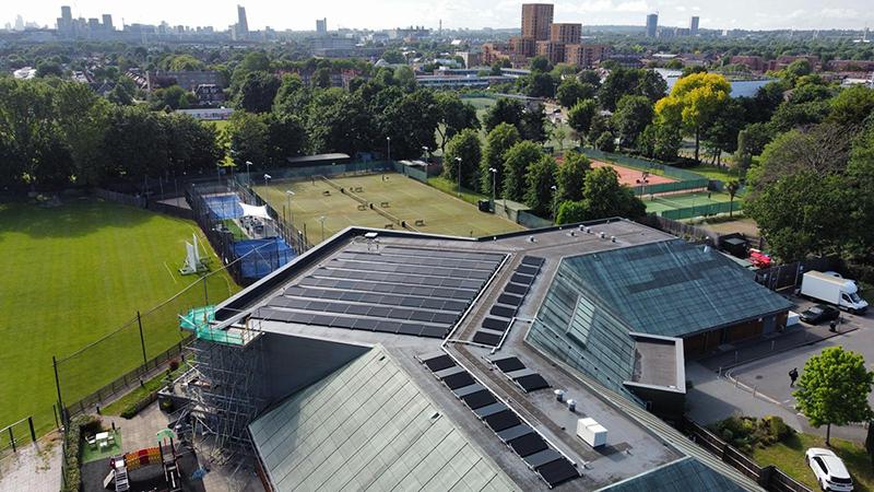 Solar panels on the roof of a David Lloyd leisure centre